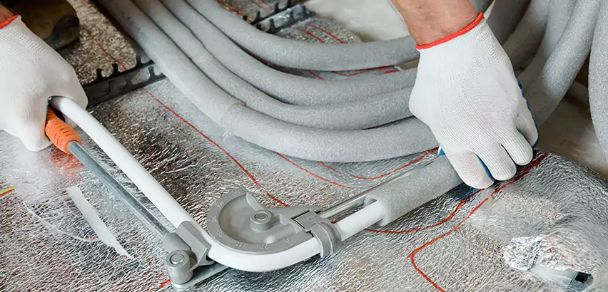 Replace Polybutylene Pipes with PEX in Merrick